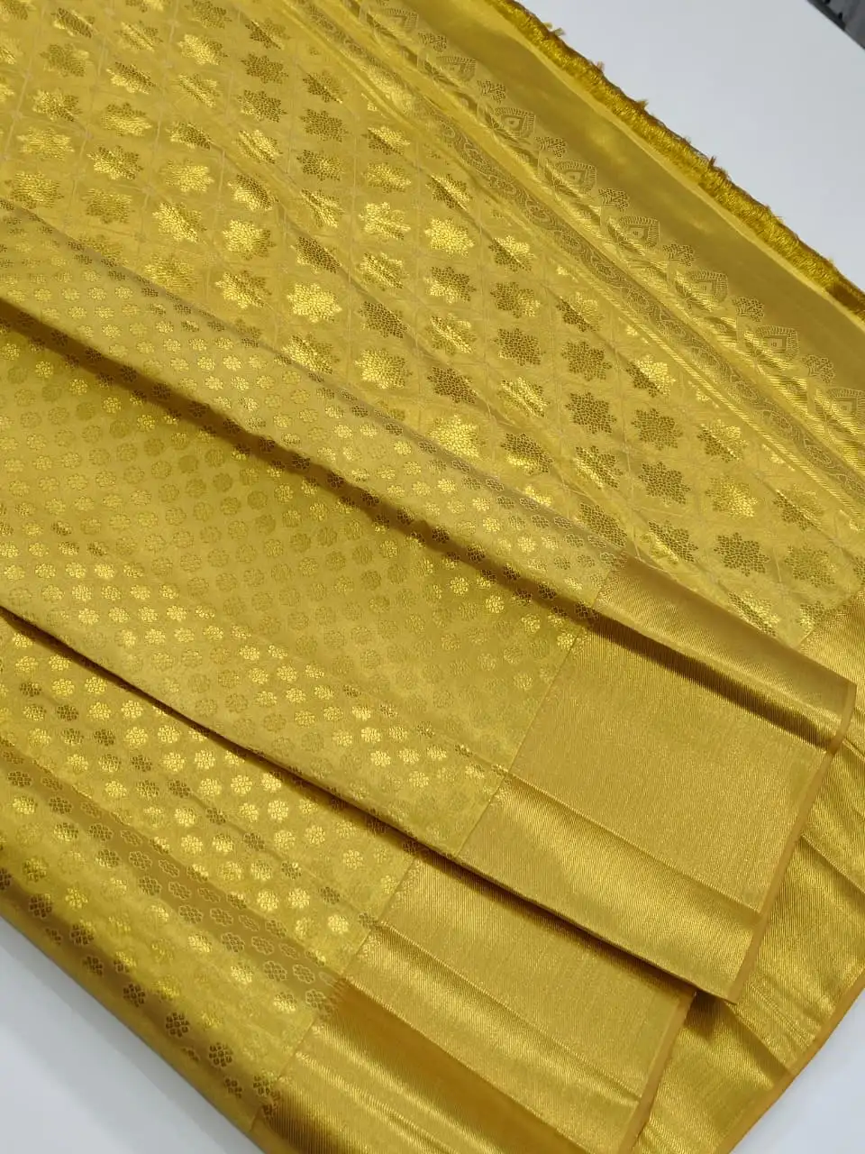 Muttu Kattam Gold Pure Kanchipuram Silk Saree.